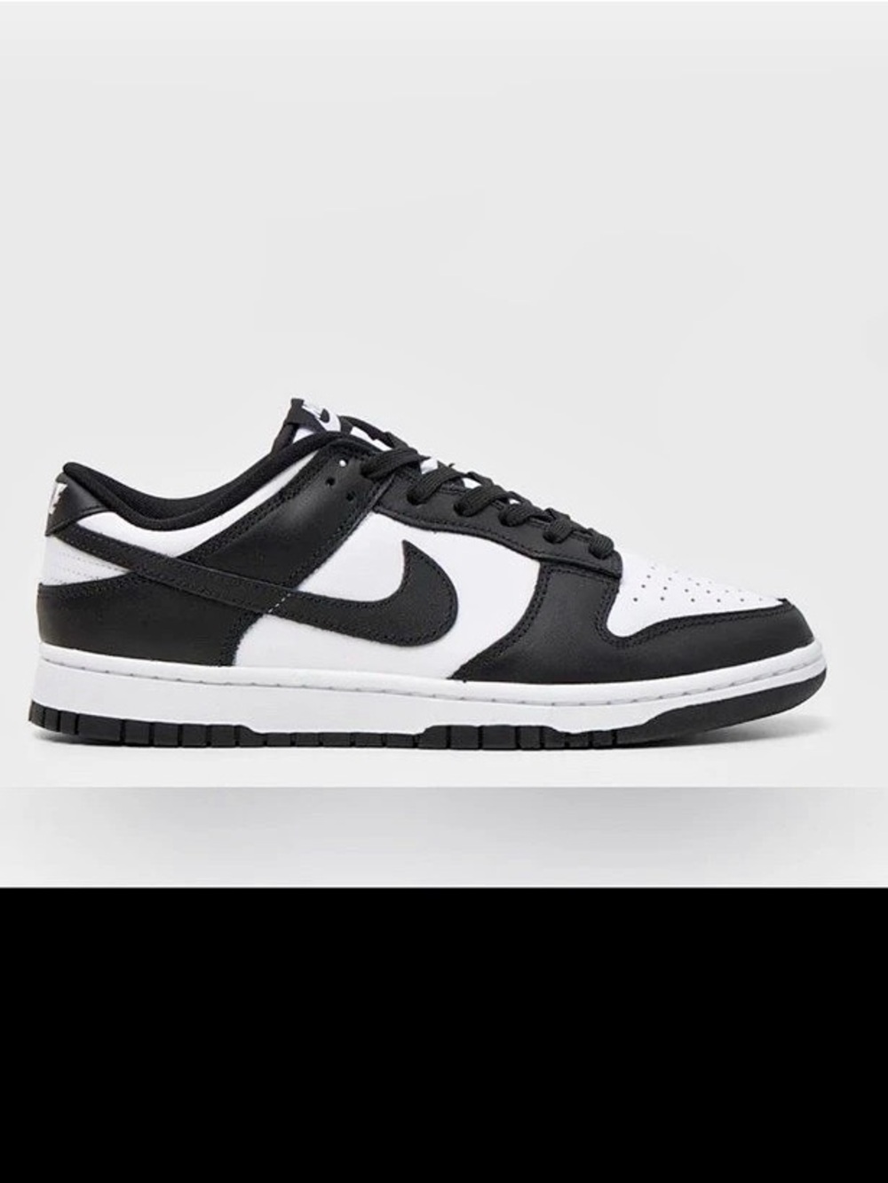 Nike Dunk Low Retro White Black Panda Sneakers in Black & White